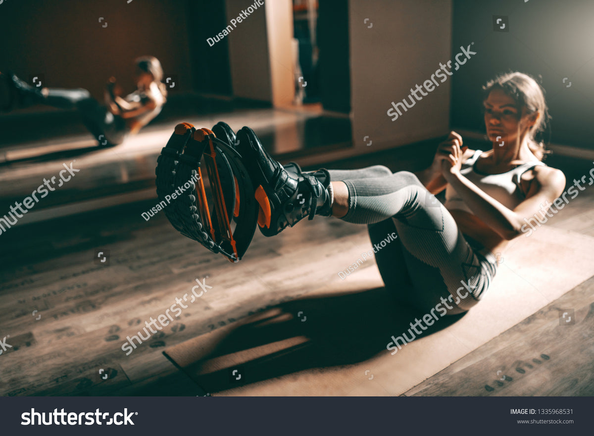 Two Women Put on Kangoo Jumping Boots and Smiles. Beautiful Girls Wearing  Shoes before Outdoor Fitness Workout Stock Photo - Image of footwear,  group: 143325054